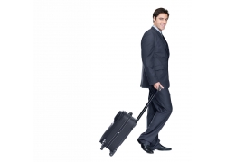 拖着行李箱的商务男性高清图片